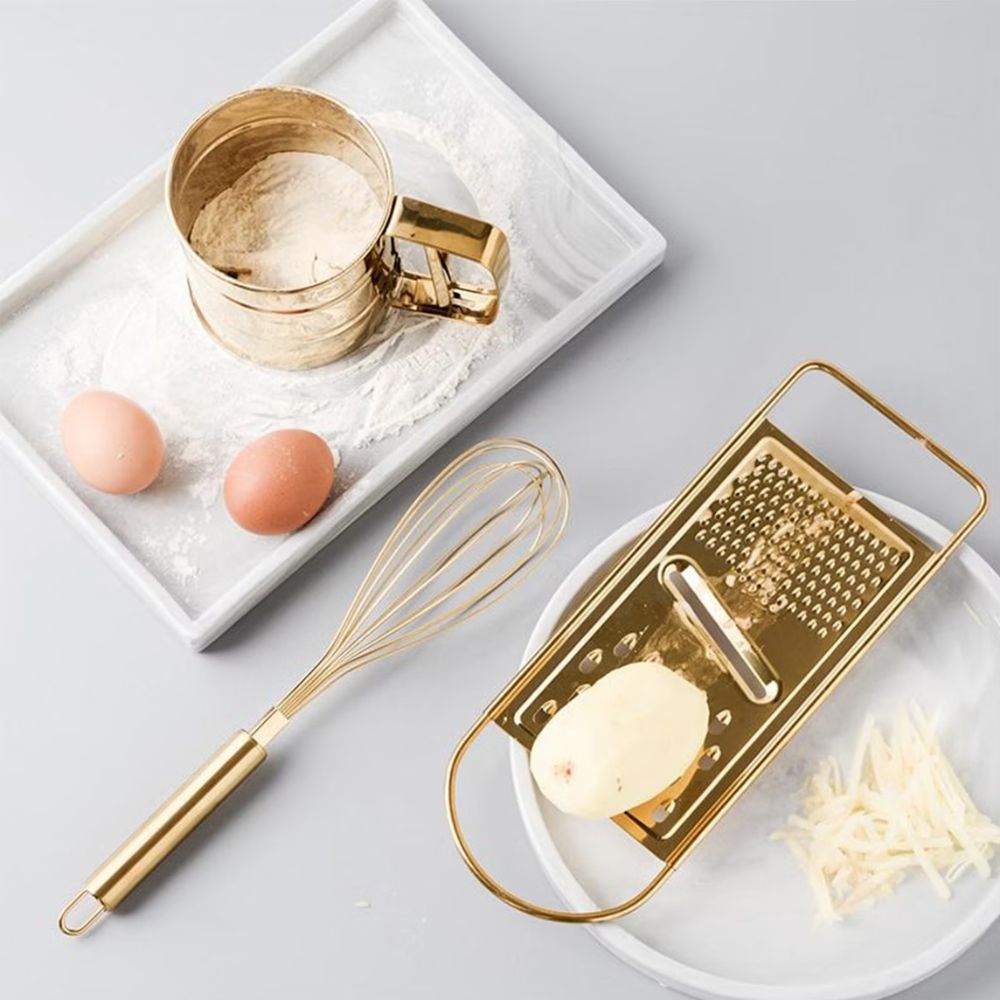 Goldene Edelstahlreibe