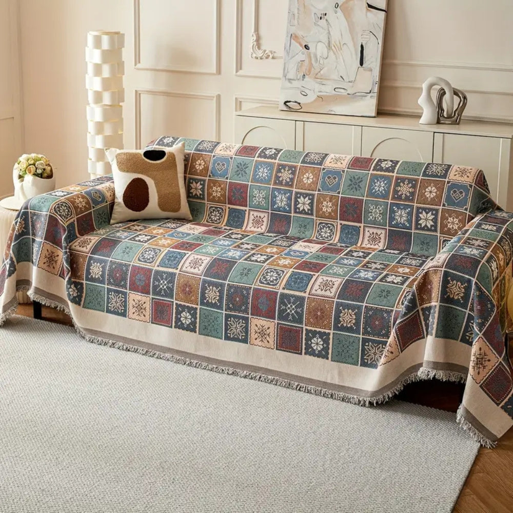Genfer Boho Stricksofaüberwurf