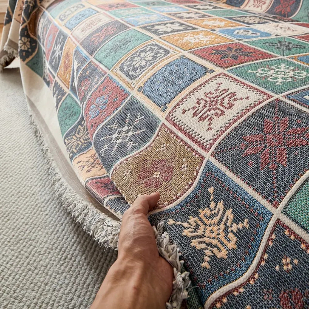 Genfer Boho Stricksofaüberwurf