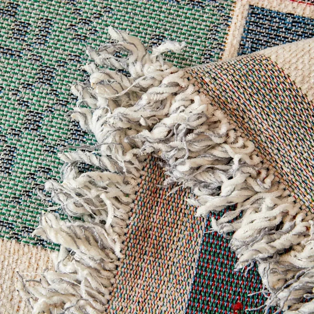 Genfer Boho Stricksofaüberwurf