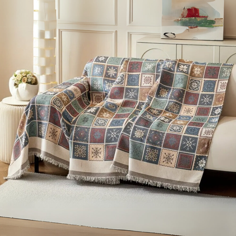 Genfer Boho Stricksofaüberwurf