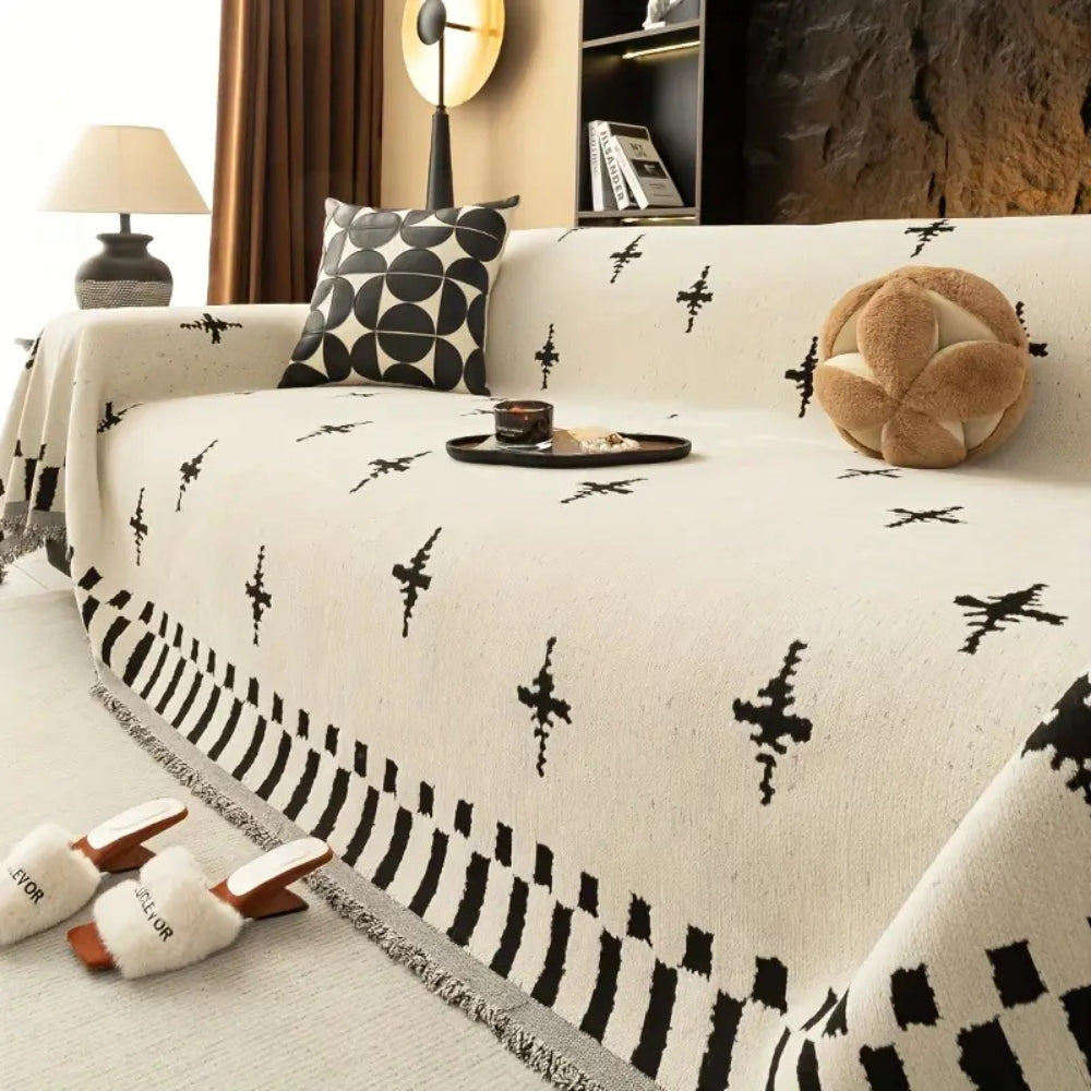 Modernes Sofaüberwurf mit Kreuzmuster