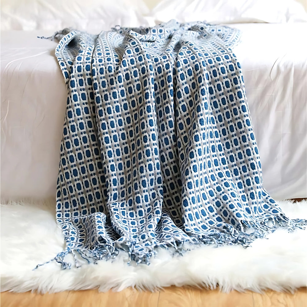 Strickdecke mit Fransen