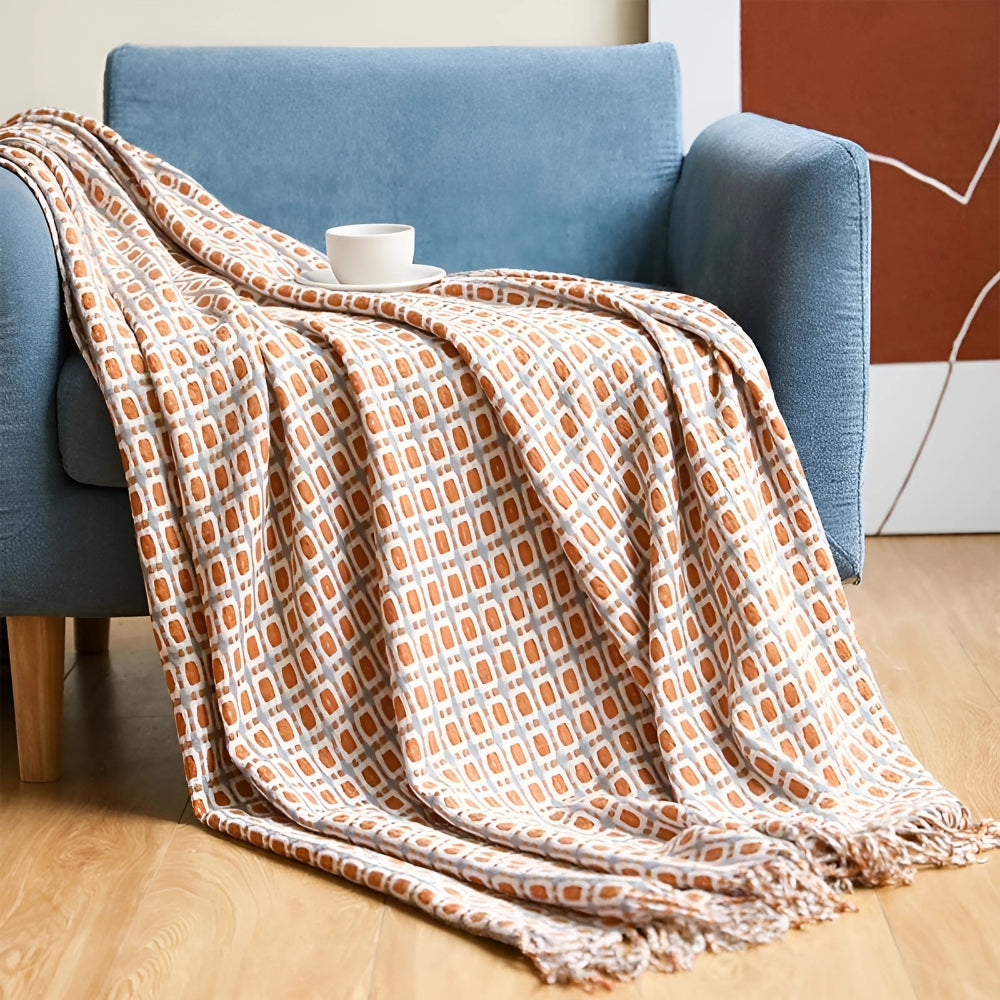 Gestrickte Couchdecke mit Fransen