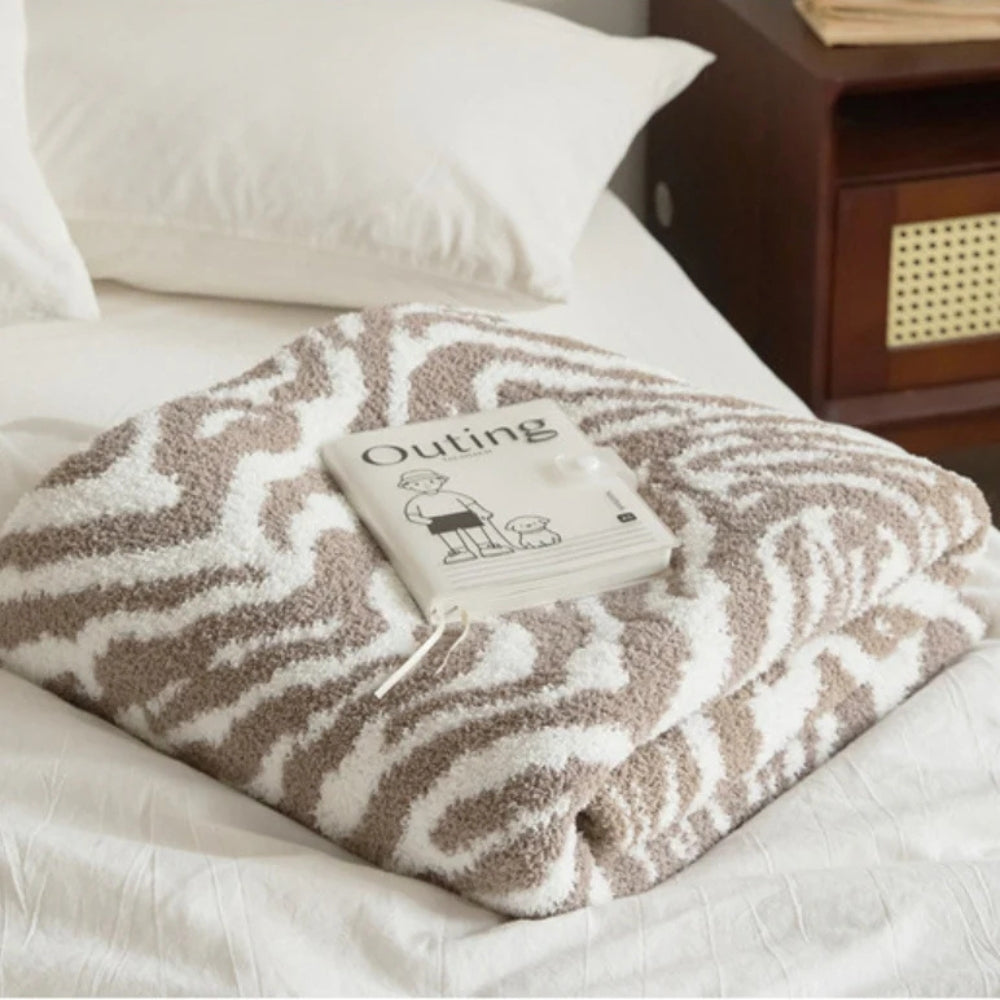 Gestrickte Zebra-Muster-Decke