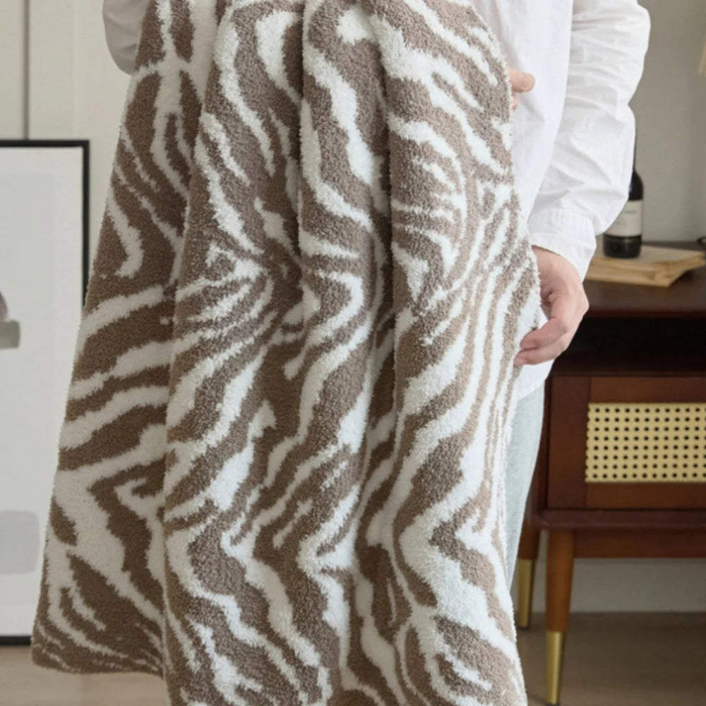 Gestrickte Zebra-Muster-Decke