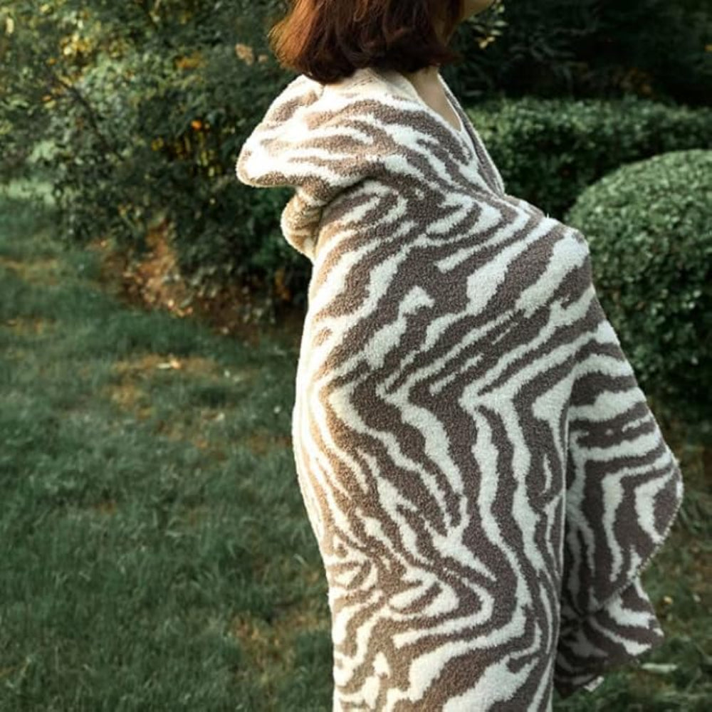 Gestrickte Zebra-Muster-Decke
