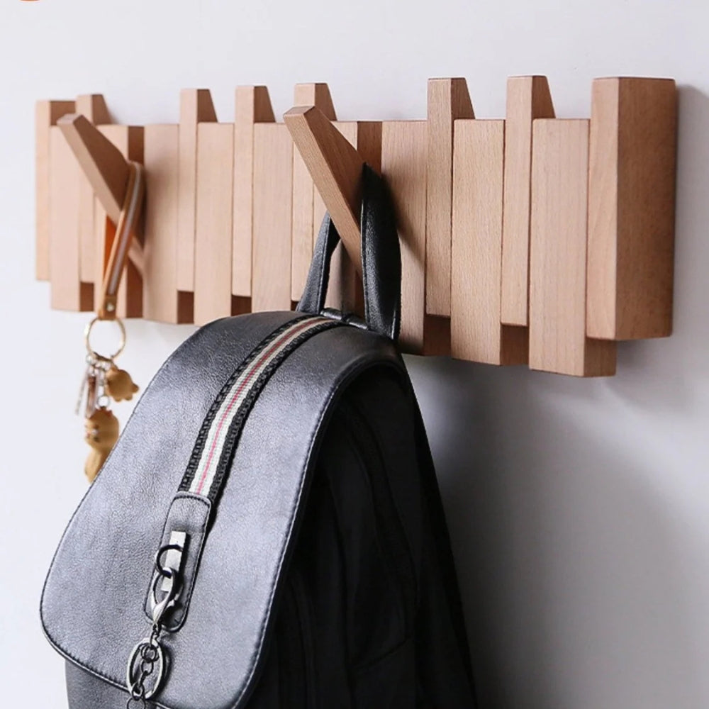 Klappbarer Holz-Wandhaken im Klavierdesign